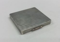 A good quality engine turned silver make-up box. B