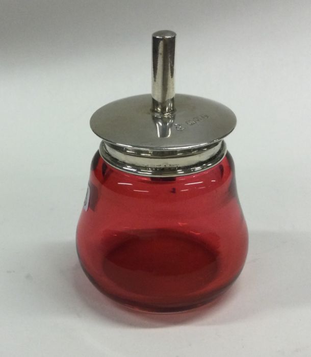 A Chester hallmarked cranberry glass pot and cover