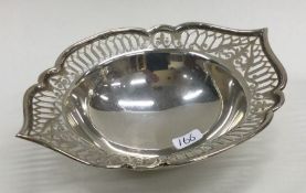 An unusual silver pierced dish of shaped form. She