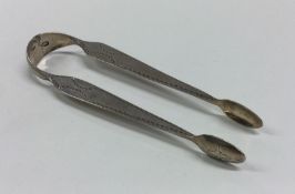 DUBLIN: A pair of unusual silver bright cut sugar