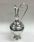 A good quality Russian silver ewer with bird decor