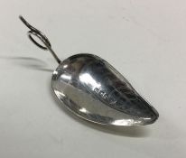 A George III silver caddy spoon of leaf form. Lond