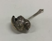 A good rare silver sifter spoon in the form of a c