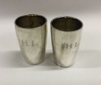 A pair of Swedish silver beakers with initialled s