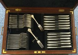 An extensive silver cutlery service of William & M