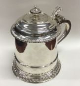 A massive oversized and hinged top lidded tankard