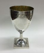 A good Georgian silver goblet on square base with