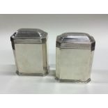 A good heavy pair of George I silver tea caddies w