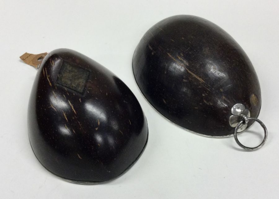 A pair of Antique silver mounted coconut cups with