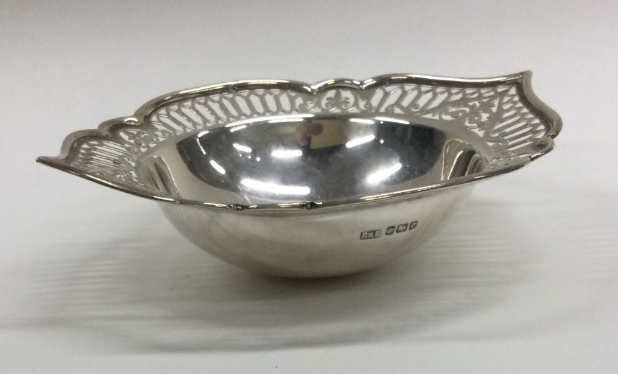 An unusual silver pierced dish of shaped form. She - Image 2 of 2