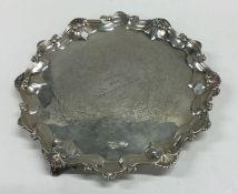 A good Victorian silver waiter of circular form to