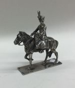 A good cast figure of Queen Elizabeth II on horseb