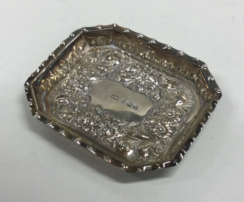 An attractive Edwardian silver dish embossed with