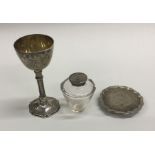 An unusual cased silver travelling communion set.