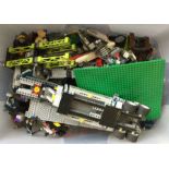 A large box containing Lego bricks of varying colo