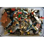 A large box containing Lego bricks of varying colo