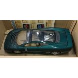 A boxed 1:12 scale diecast MAISTO Jaguar XJ220 (19