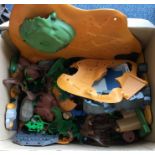 A box containing Playmobil landscapes, scenery and