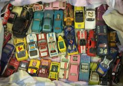 A box containing diecast and other toy race cars.