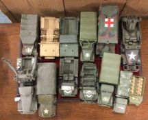 A collection of toy army vehicles of varying maker