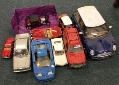 A group of diecast and other model toy cars of var