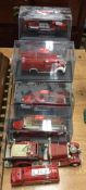 A collection of SIGNATURE series toy fire engines.