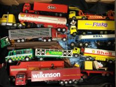 A diecast toy petrol tanker together with other ar