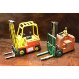 DINKY: Two diecast toy forklift trucks of varying