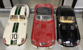 Three diecast models of toy cars of varying makers