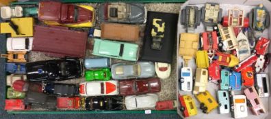A collection of diecast and other toy trailers and