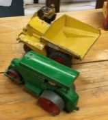 DINKY: A diecast toy dumper truck together with a