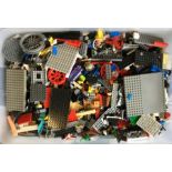 A large box containing Lego bricks of varying colo
