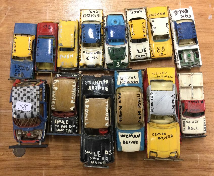 A collection of CORGI toy banger racing cars.