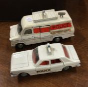 DINKY: A diecast toy police van together with a po