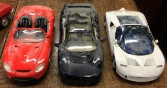 MAISTO: Three diecast toy supercars of varying des