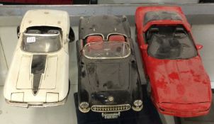 Three diecast models of toy cars of varying makers