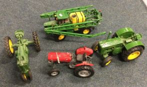 An ERTL diecast toy John Deere tractor together wi