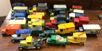 A collection of diecast and other toy lorries and