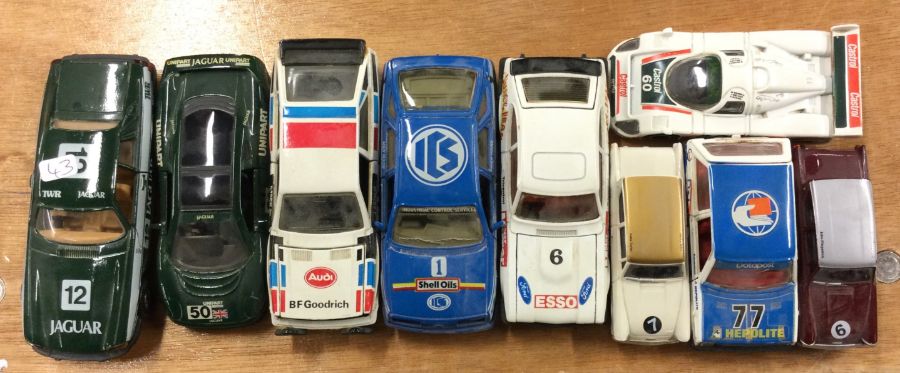 Nine CORGI and other similar race cars of varying