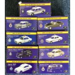 ATLAS: A selection of 9 boxed diecast toy police c