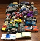 A collection of diecast and other HOTWHEELS toy ca