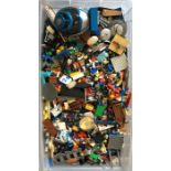 A large box containing Lego bricks of varying colo