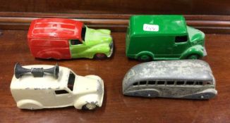 DINKY: A diecast toy coach together with three toy