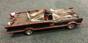 HOTWHEELS: A large model of the 'Batmobile'. (1)