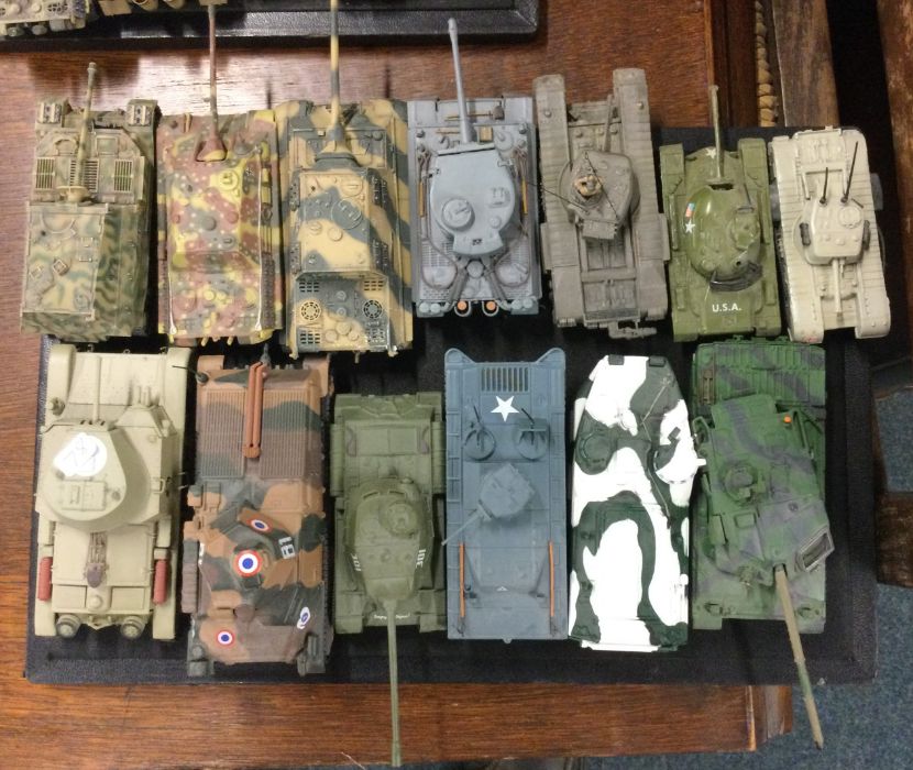 A collection of toy Military tanks of varying make