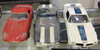 Three diecast models of toy cars of varying makers