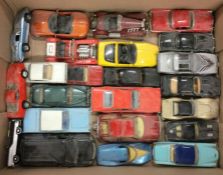 A box containing American and other diecast toy ca