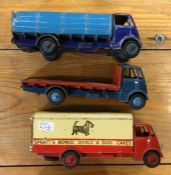 DINKY: A diecast toy lorry together with two flatb
