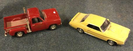 ERTL: A diecast toy pick-up together with one othe