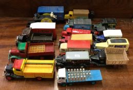 A collection of diecast and other toy lorries and